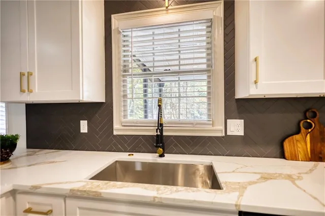 a bathroom with a shower and toilet