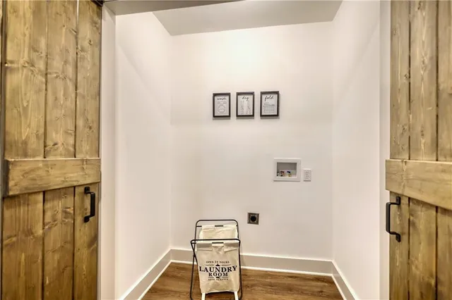 a view of house with backyard and trees