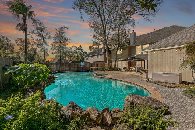 a view of a backyard with garden