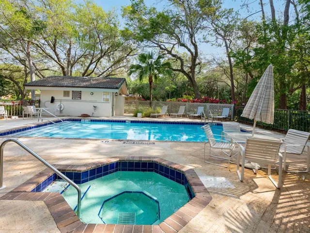 a view of a backyard with a small cabin