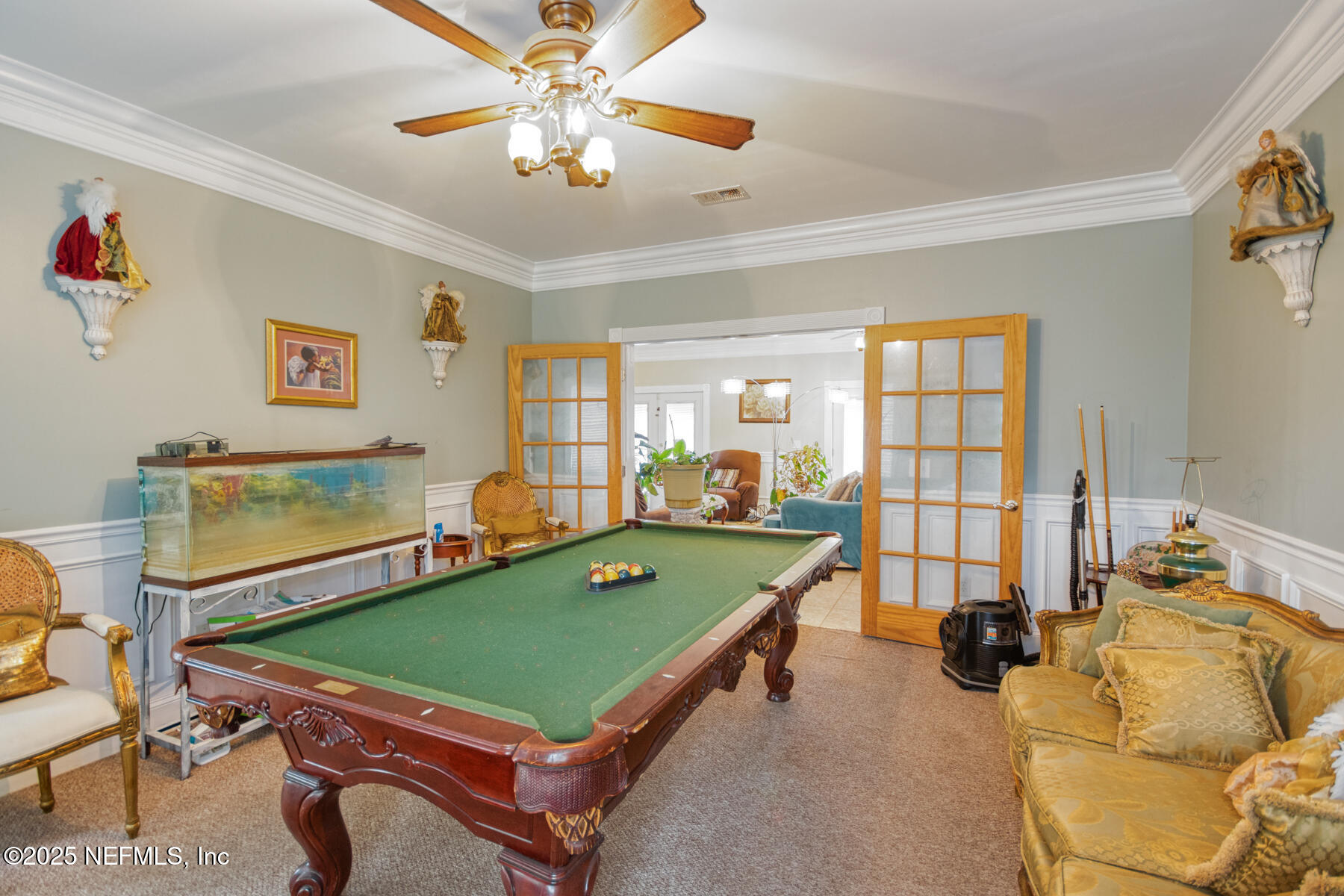 3704 Northeast Rocky Ford Road Madison, FL 32340 - Photo 12 of 34 a room with pool table and windows