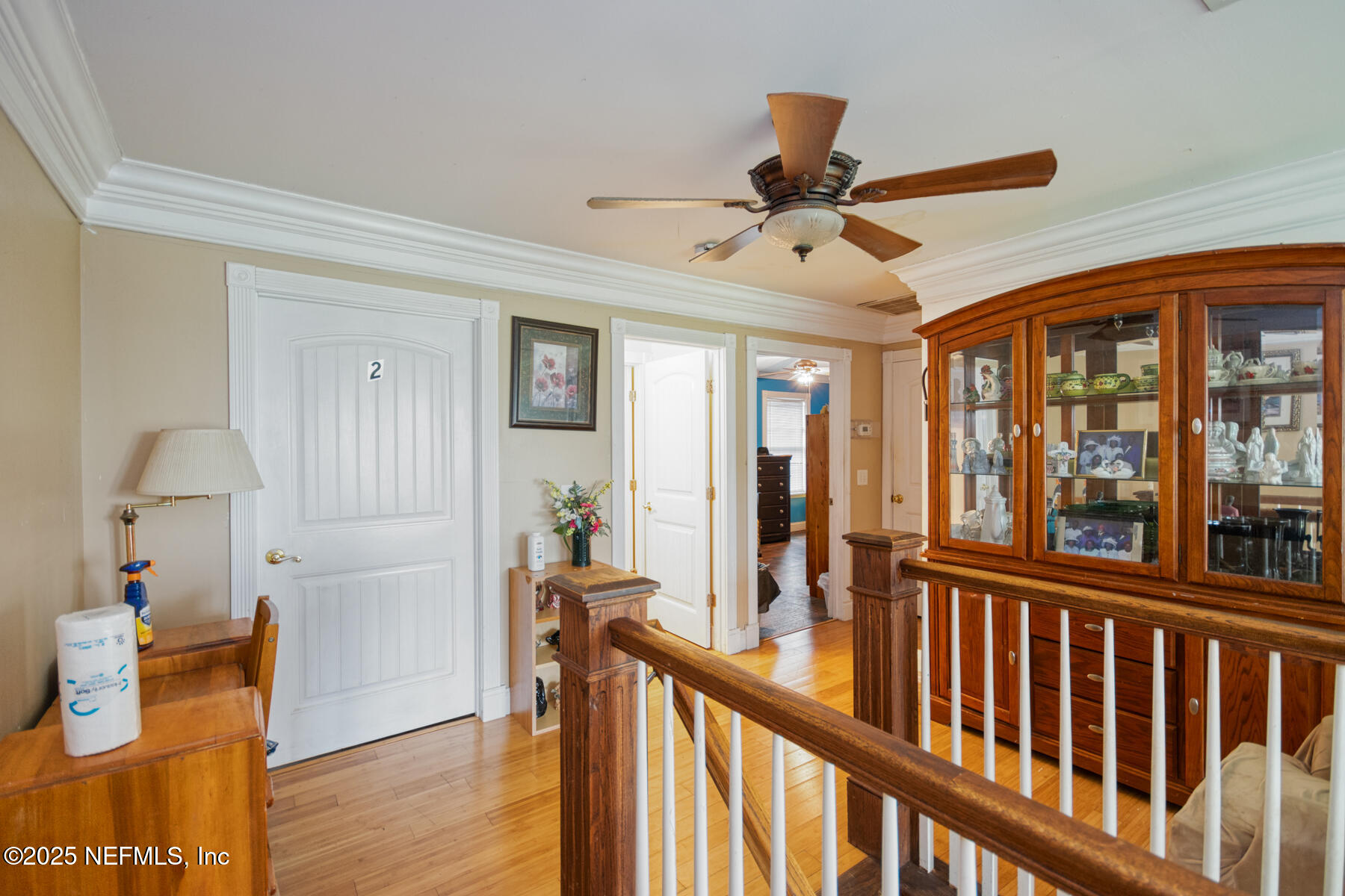 3704 Northeast Rocky Ford Road Madison, FL 32340 - Photo 20 of 34 a view of a room with wooden floor fan and windows