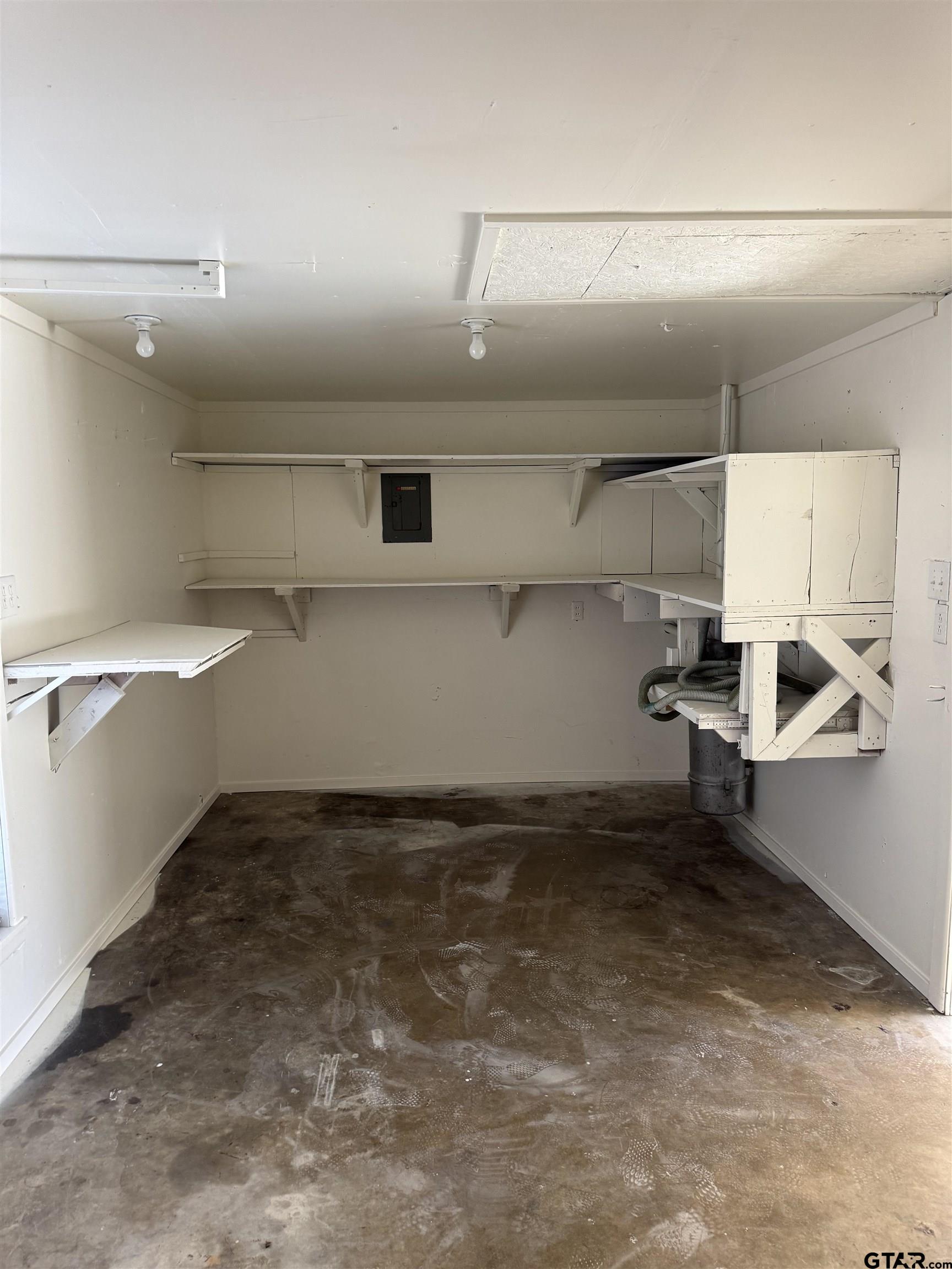 1823 Overbrook Drive Tyler, TX 75703 - Photo 38 of 48 a view of a room with racks on the wall