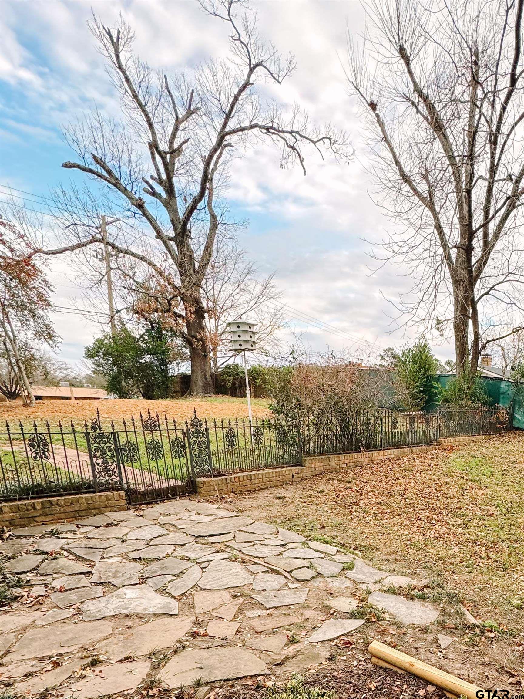 1823 Overbrook Drive Tyler, TX 75703 - Photo 40 of 48 a view of terrace with tree