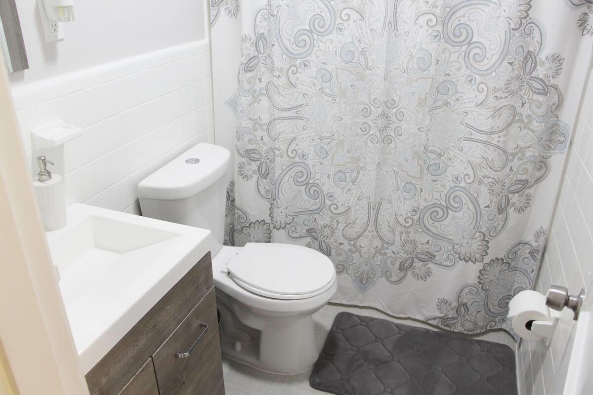 147 Roberta Drive Memphis, TN 38112 - Photo 9 of 14 a white toilet sitting next to a white sink