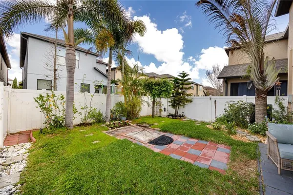 a front view of house with yard and entertaining space