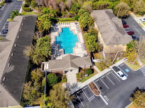 a view of a park with swings and slides