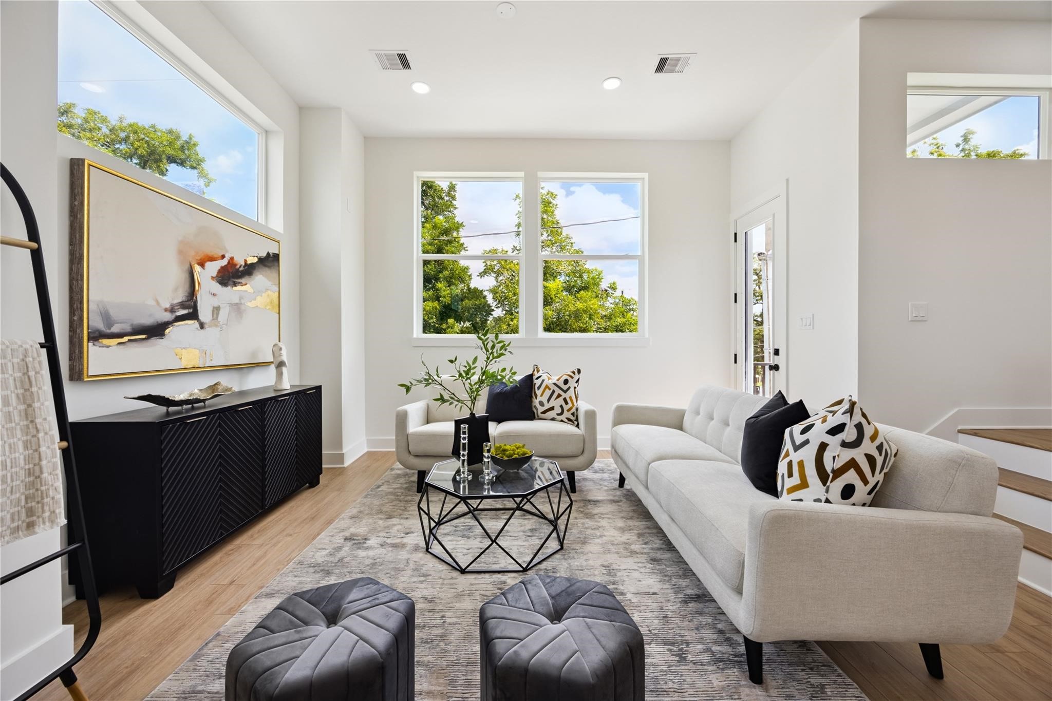 835 Rachel Street, Unit D Houston, TX 77091 - Photo 9 of 22 a living room with furniture and a large window