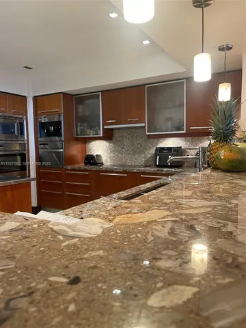 a living room with furniture or couch and a flat screen tv