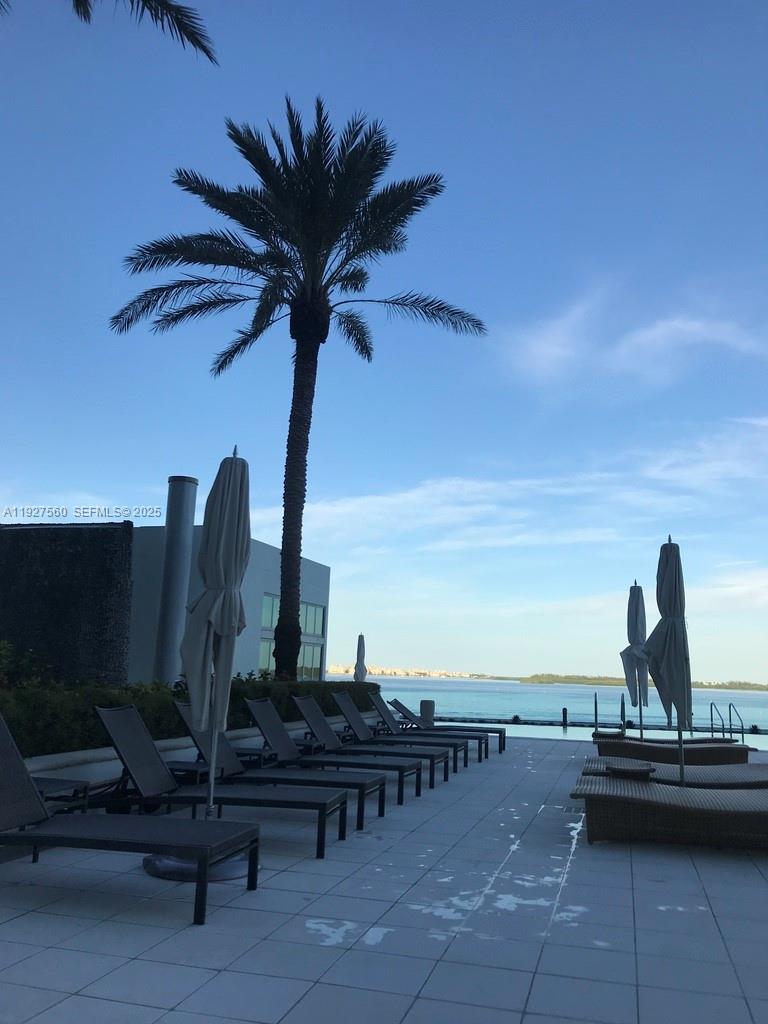1331 Brickell Bay Drive, Unit 3607 Miami, FL 33131 - Photo 5 of 35 a view of a terrace with chairs