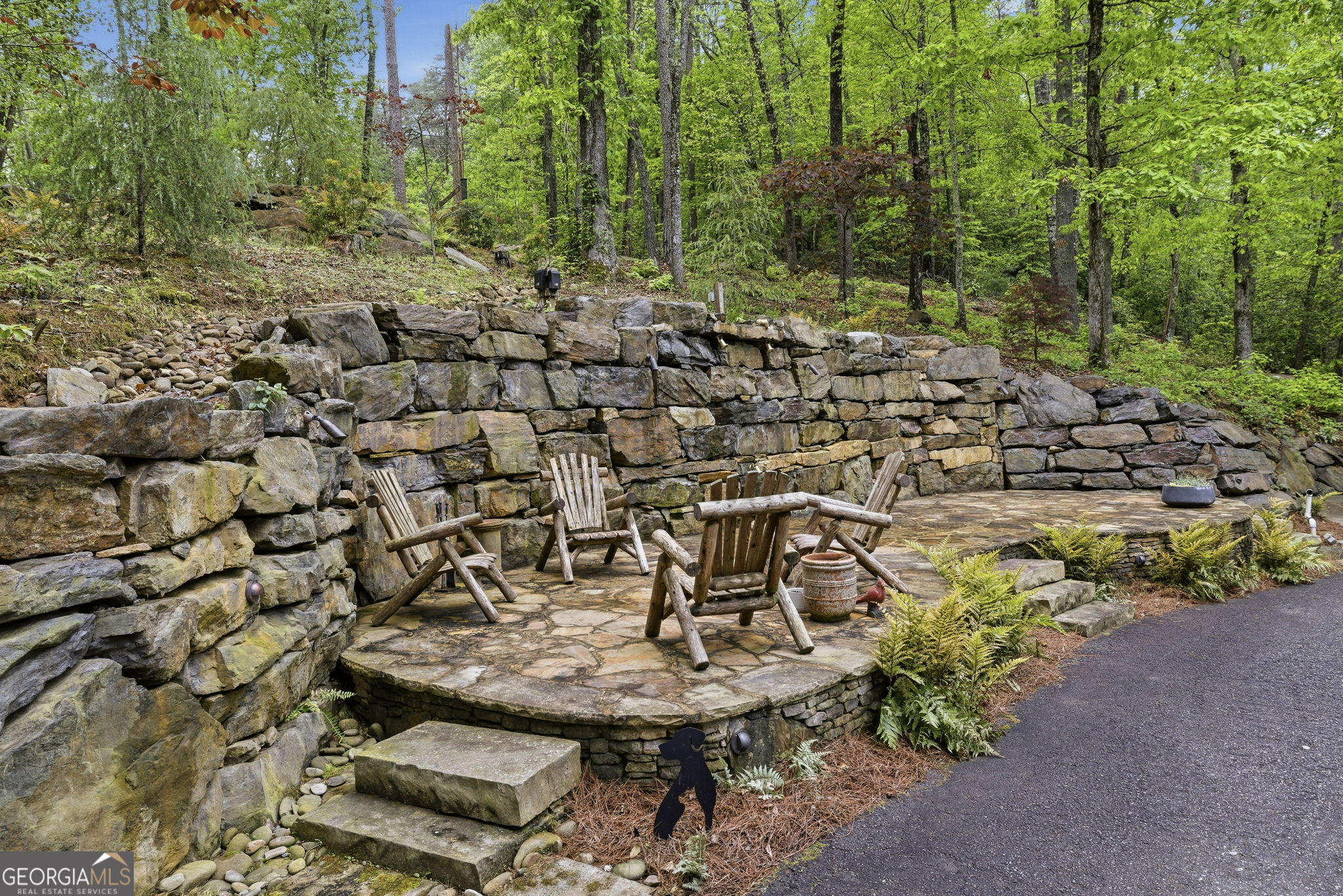 634 Little Hawk Road Sautee Nacoochee, GA 30571 - Photo 46 of 54 a view of a garden with a bench