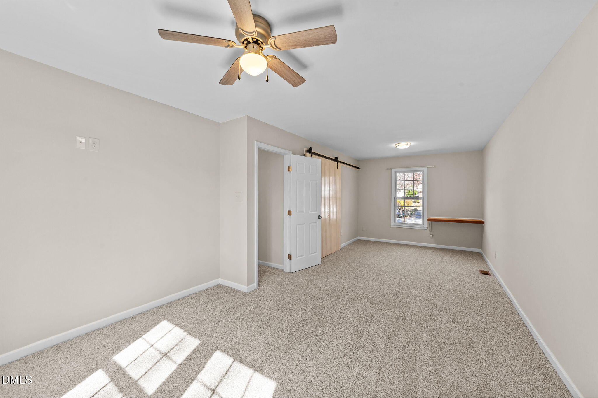 205 November Street Garner, NC 27529 - Photo 20 of 26 a view of an empty room with a window