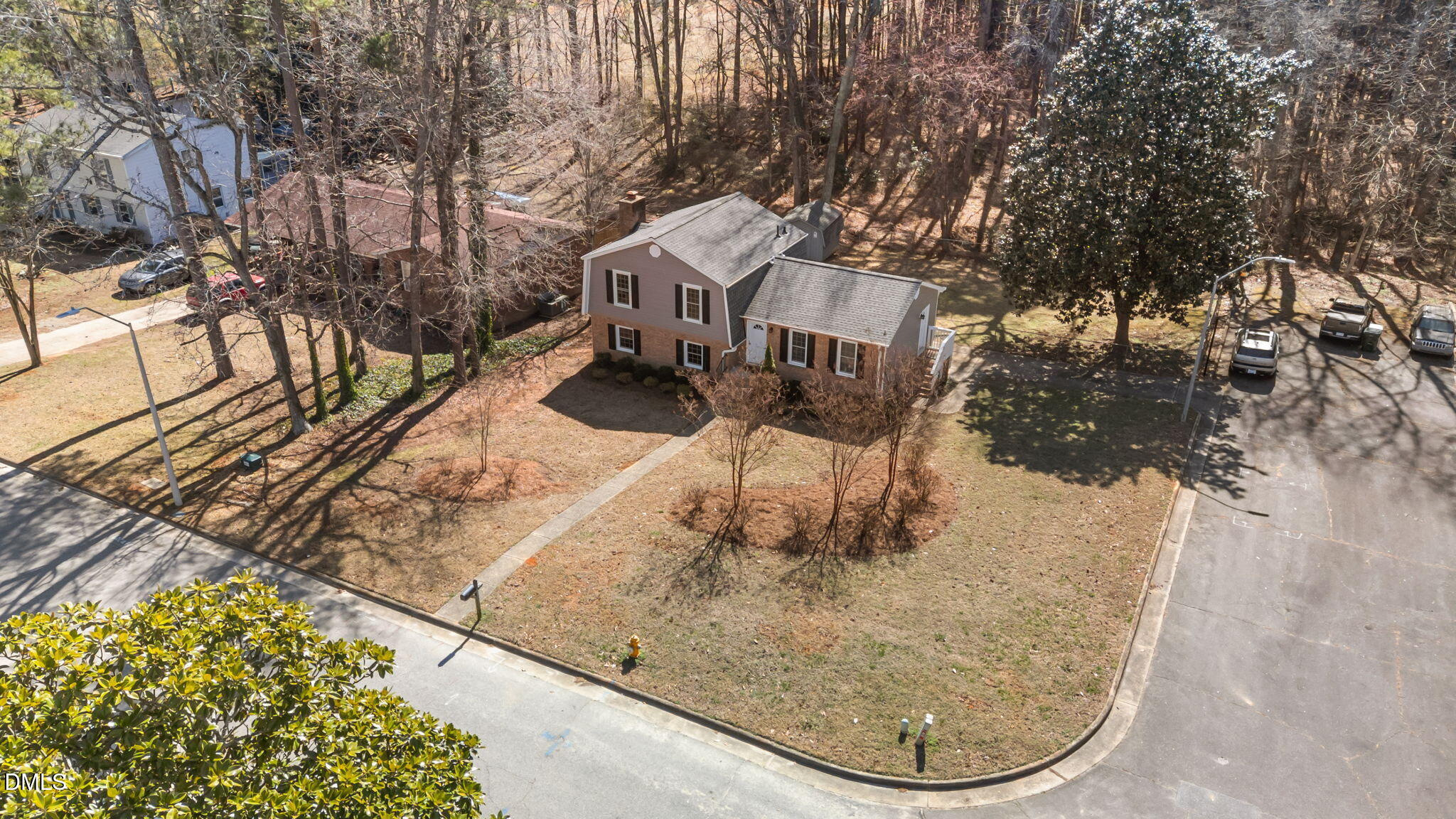 205 November Street Garner, NC 27529 - Photo 3 of 26 a view of a house with a snow in the yard