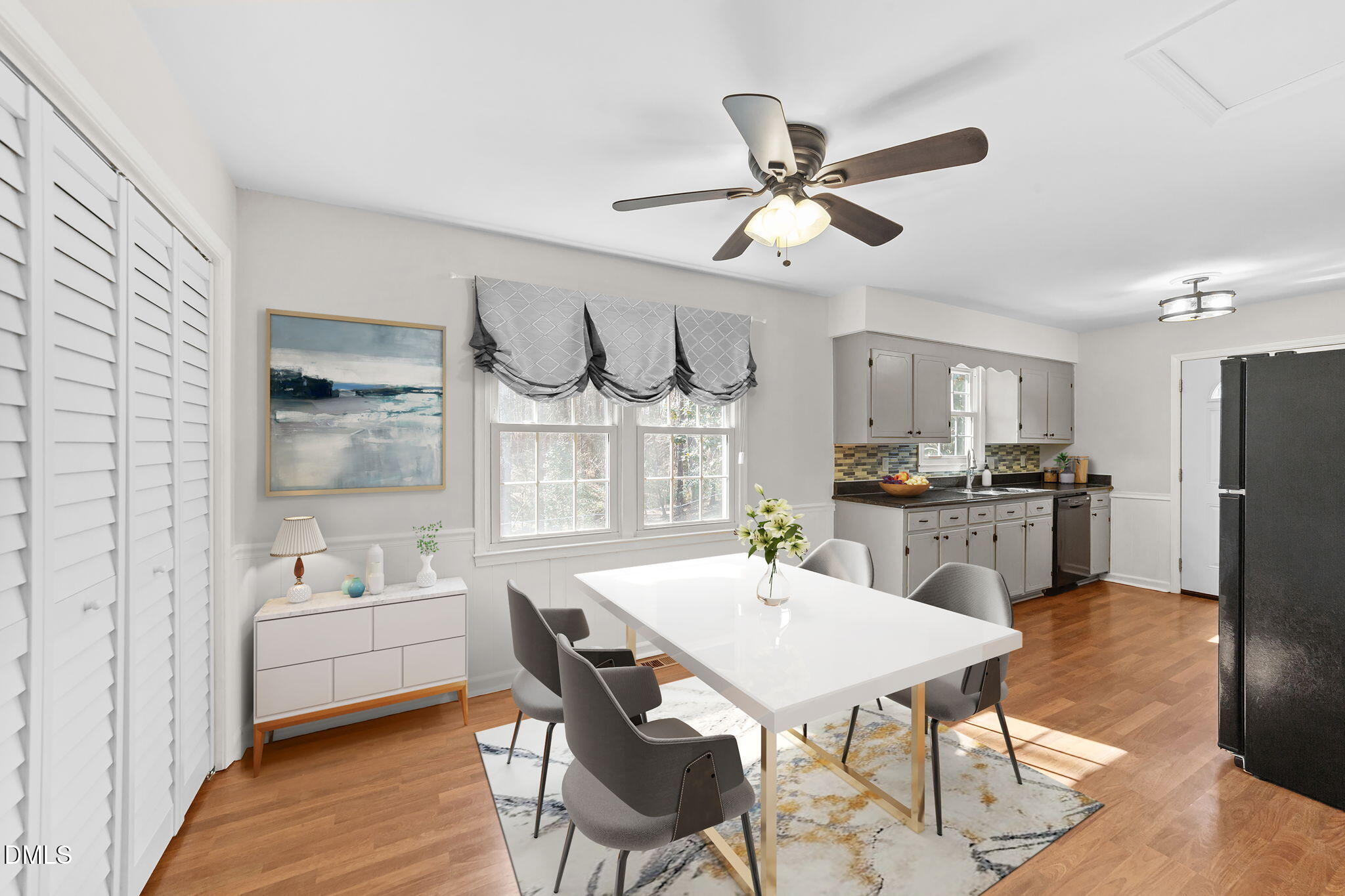 205 November Street Garner, NC 27529 - Photo 9 of 26 a view of a dining room with furniture and wooden floor
