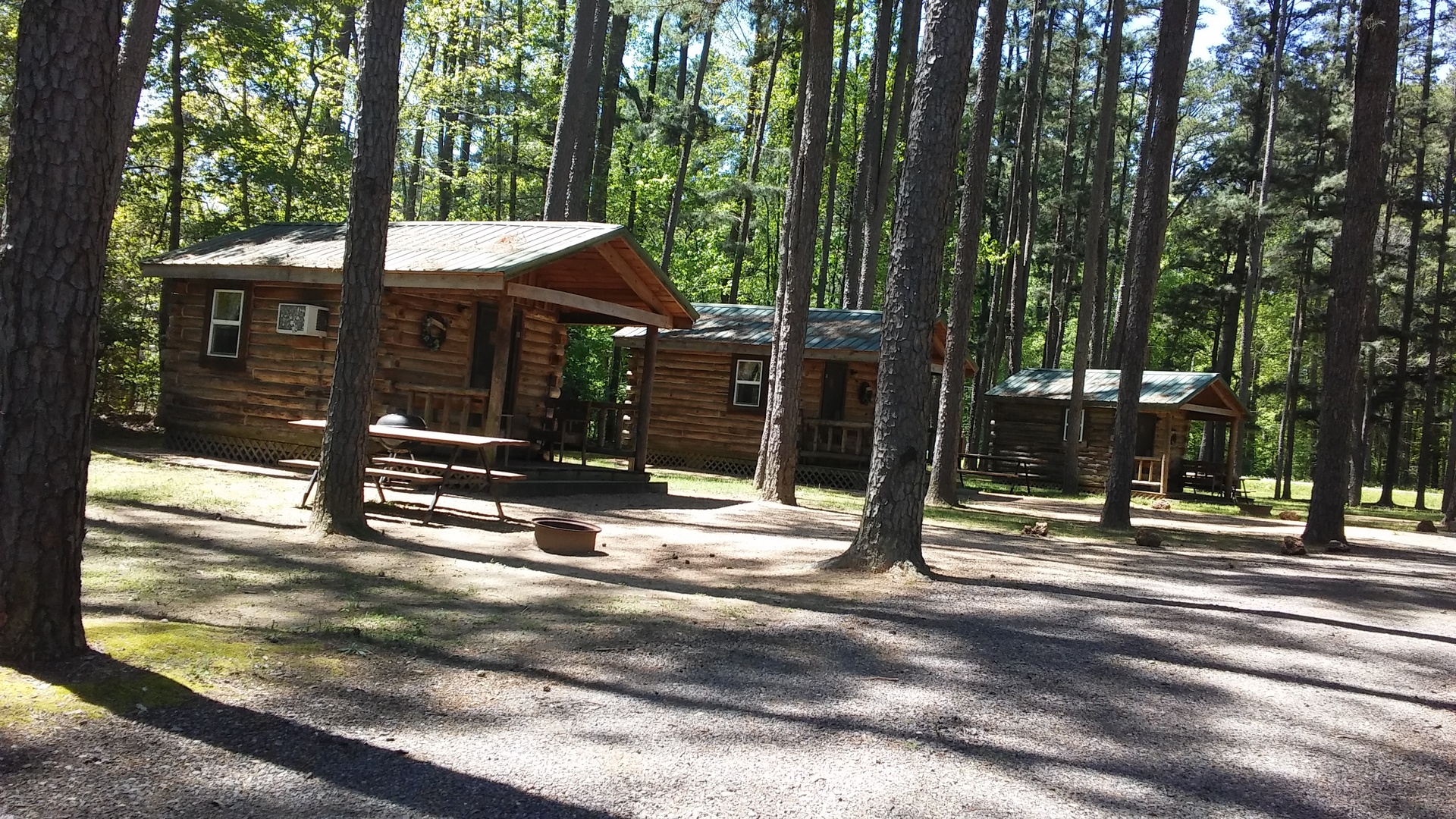 a view of a house with a tree in the background