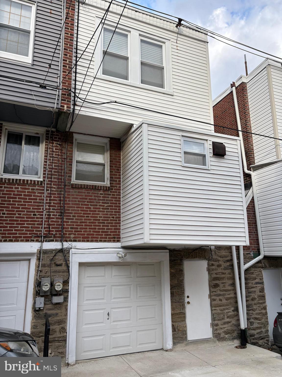 1934 73rd Avenue Philadelphia, PA 19138 - Photo 47 of 48 a front view of a house with garage