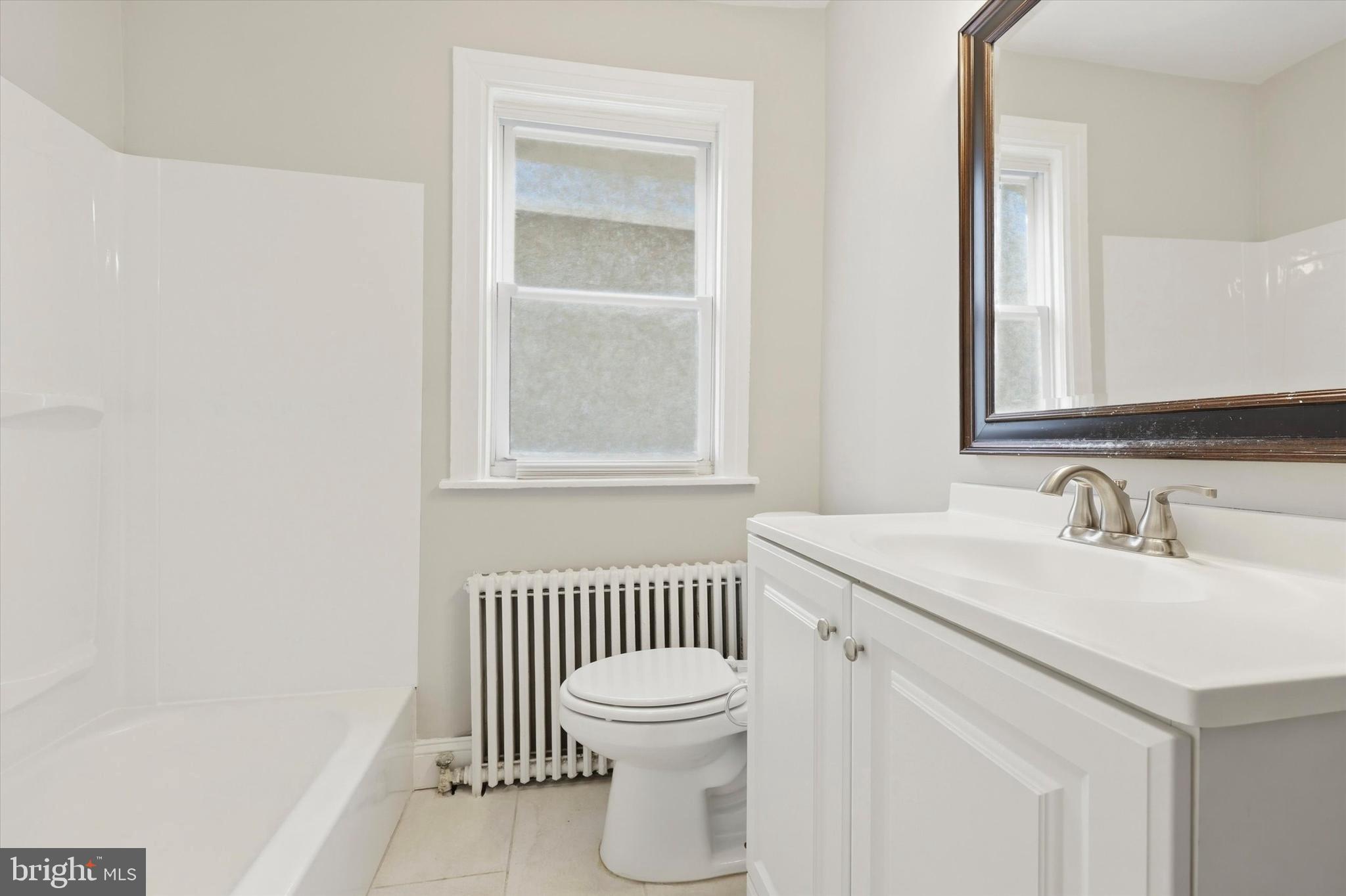 2052 Heather Road Folcroft, PA 19032 - Photo 10 of 17 a bathroom with a sink and a toilet