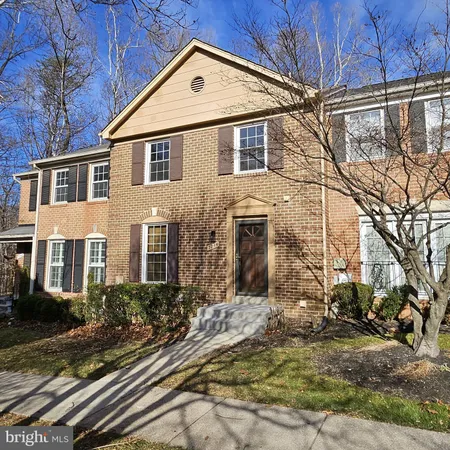 a view of a yard in front of a house