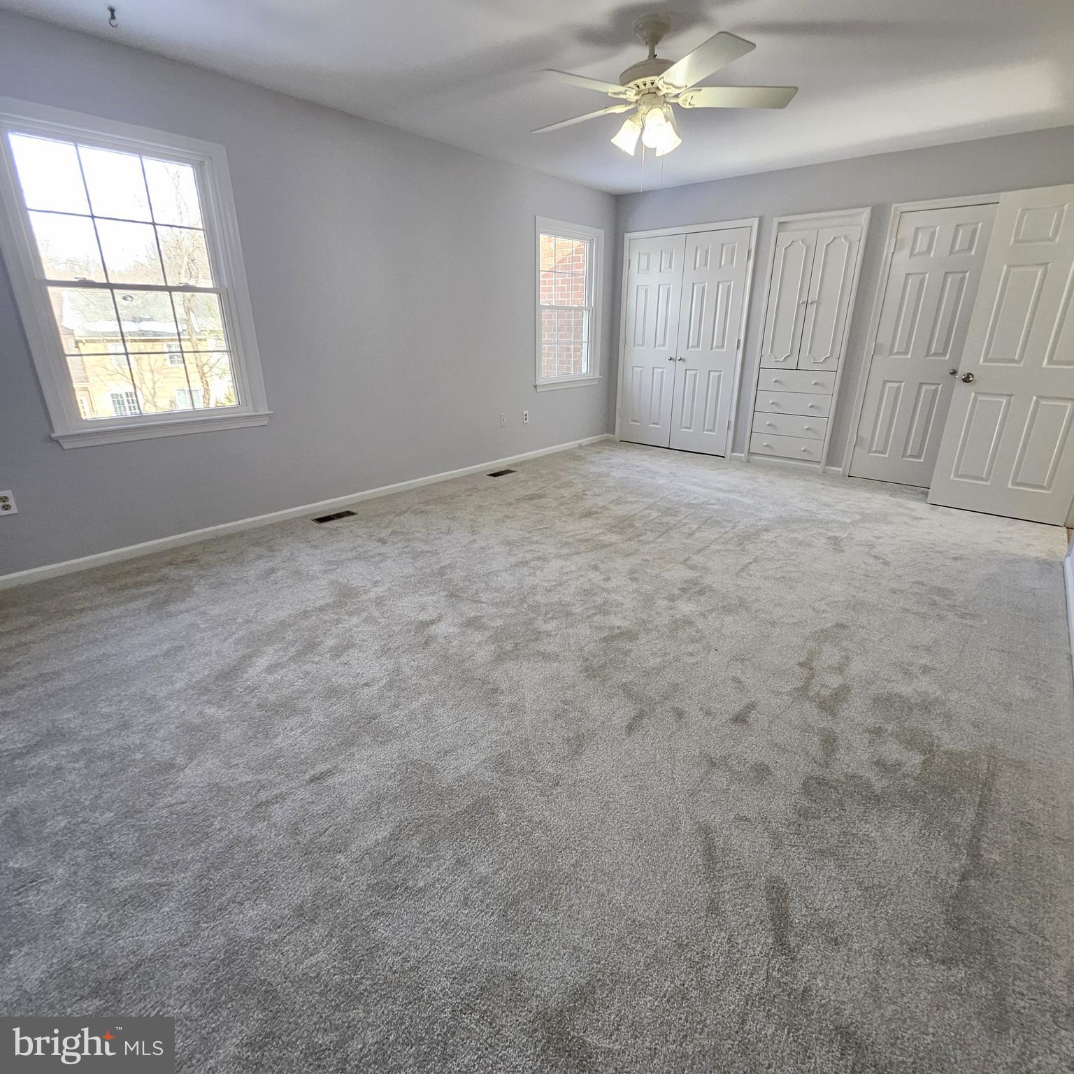 7244 Greentree Road Bethesda, MD 20817 - Photo 12 of 21 Primary Bedroom w/ built ins and a wall of closets