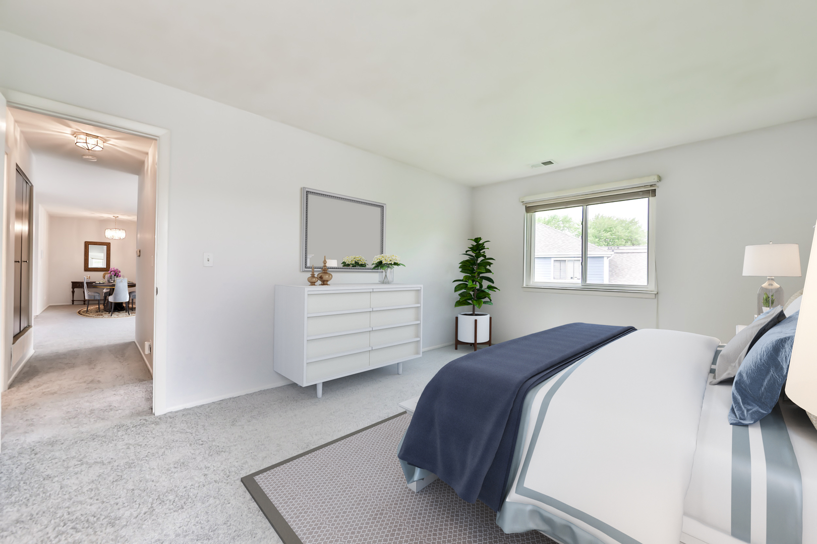1502 7 Pines Road, Unit D2 Schaumburg, IL 60193 - Photo 11 of 34 a bedroom with a bed and a couch