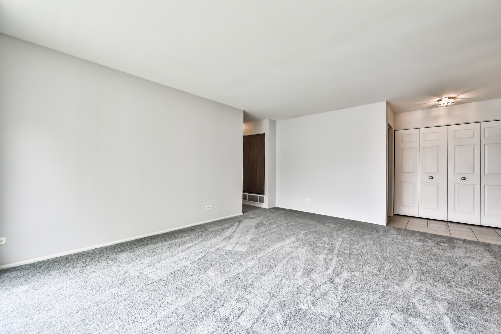 1502 7 Pines Road, Unit D2 Schaumburg, IL 60193 - Photo 16 of 34 a view of an empty room
