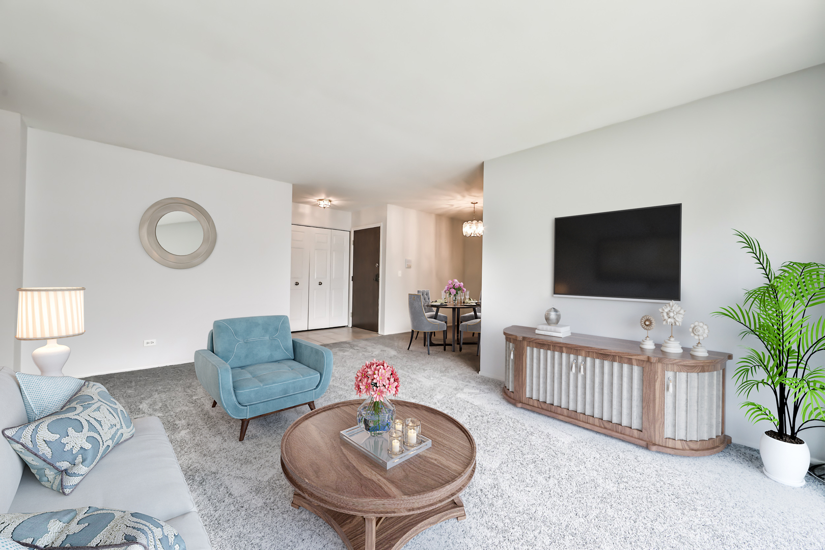 1502 7 Pines Road, Unit D2 Schaumburg, IL 60193 - Photo 17 of 34 a living room with furniture and a flat screen tv