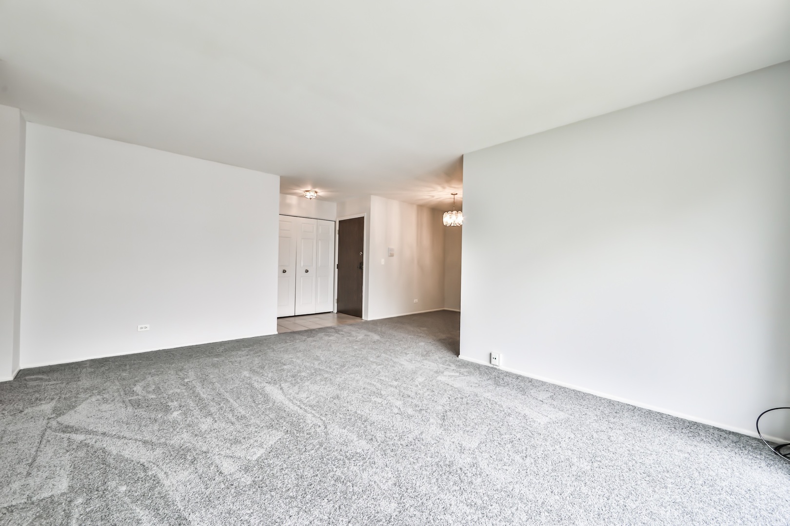 1502 7 Pines Road, Unit D2 Schaumburg, IL 60193 - Photo 18 of 34 a view of an empty room