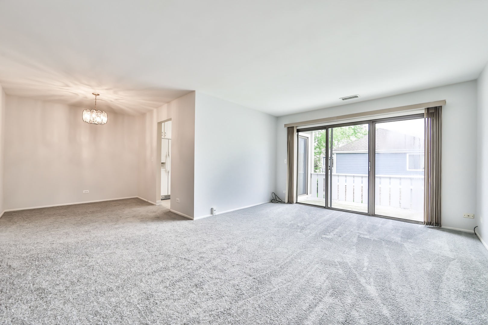 1502 7 Pines Road, Unit D2 Schaumburg, IL 60193 - Photo 20 of 34 a view of an empty room with a window