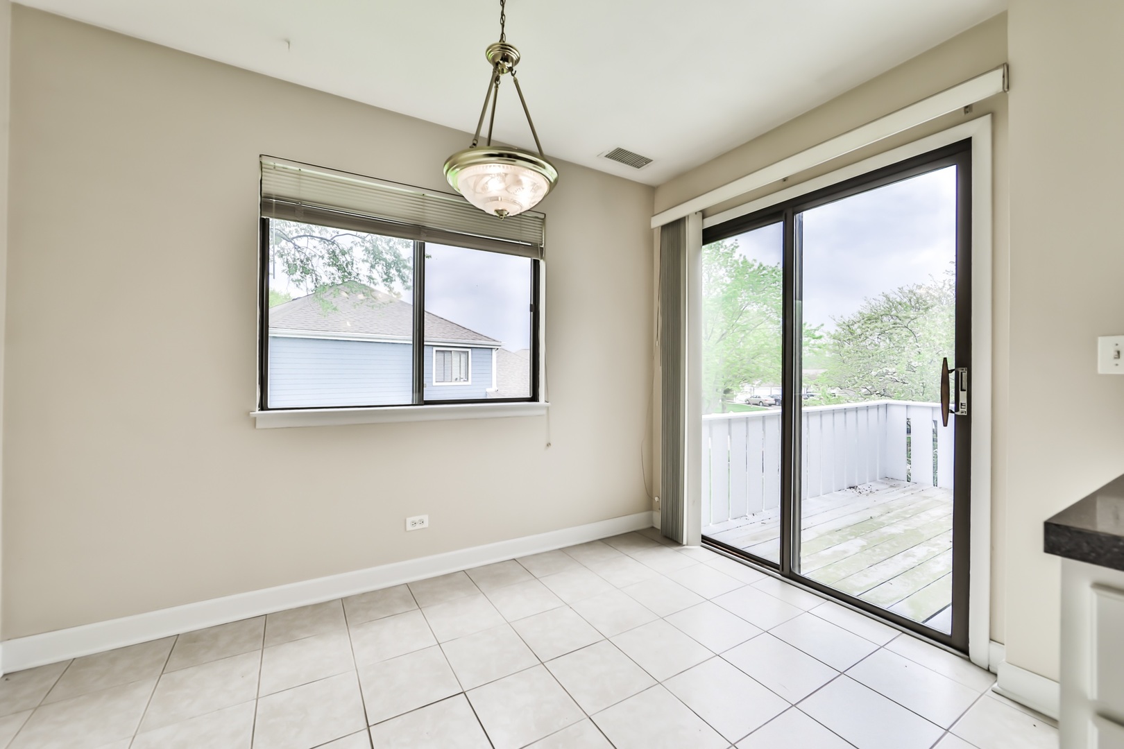 1502 7 Pines Road, Unit D2 Schaumburg, IL 60193 - Photo 30 of 34 a view of an empty room with a window