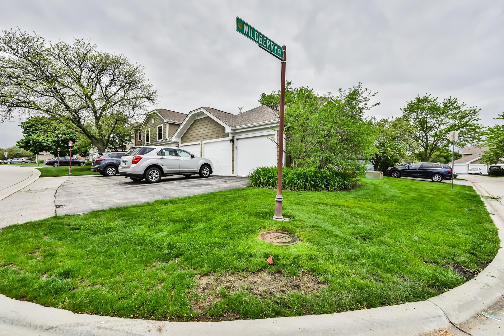 1502 7 Pines Road, Unit D2 Schaumburg, IL 60193 - Photo 34 of 34 a view of street with parked cars