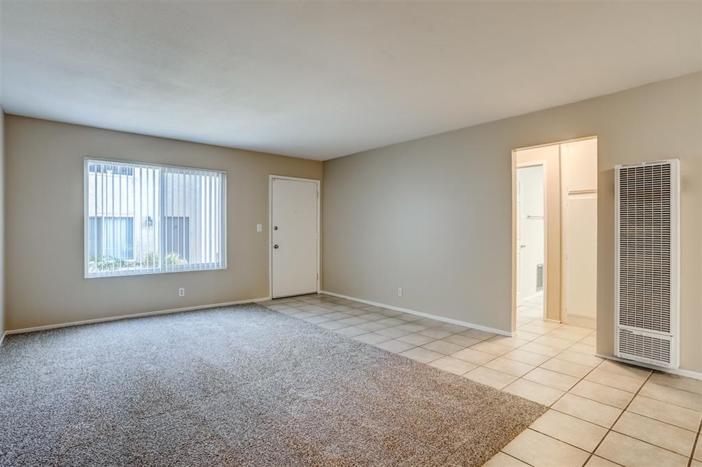 1219 Mitchell Street, Unit D Oceanside, CA 92054 - Photo 5 of 13 an empty room with windows