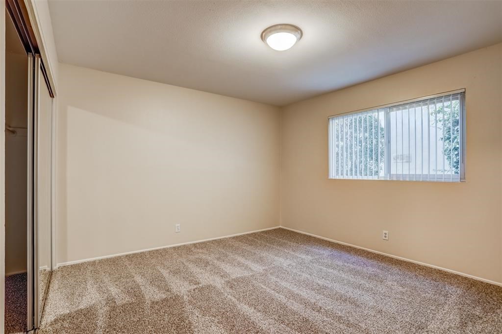 1219 Mitchell Street, Unit D Oceanside, CA 92054 - Photo 10 of 13 an empty room with a window