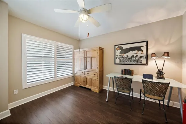 a workspace with furniture and window