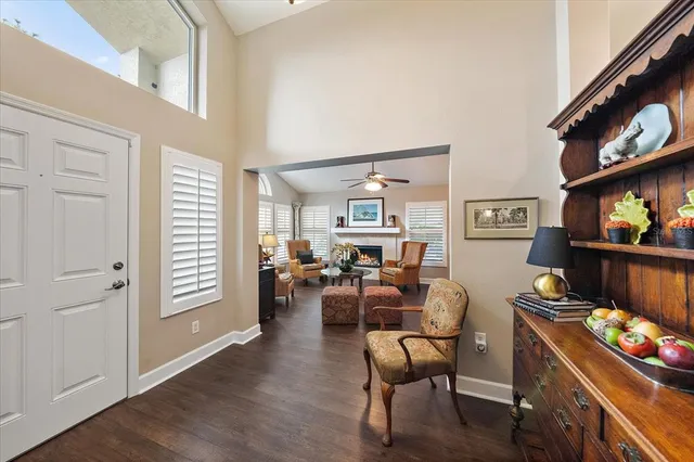 a room with furniture and a flat screen tv