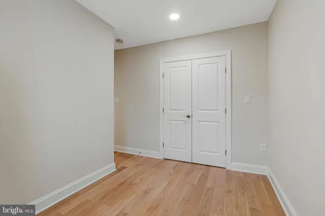 a bathroom with a toilet sink and shower