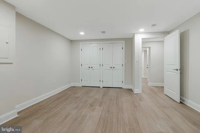 a kitchen with stainless steel appliances granite countertop a refrigerator microwave and stove