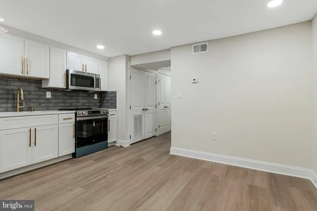 a view of room with hardwood floor