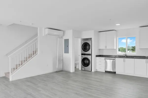 a view of entryway with wooden floor