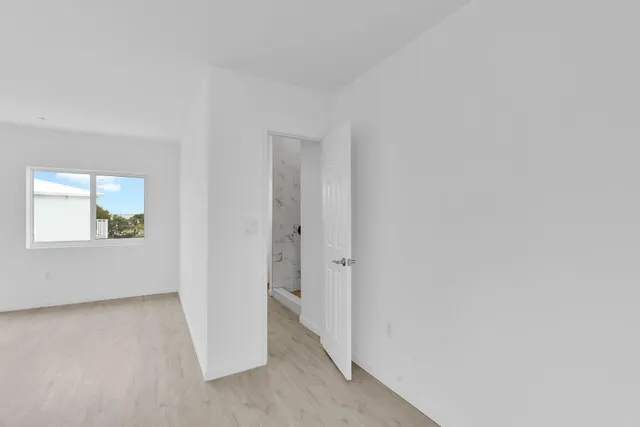 a view of entryway with wooden floor