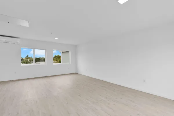 a outdoor living space with furniture and a potted plant