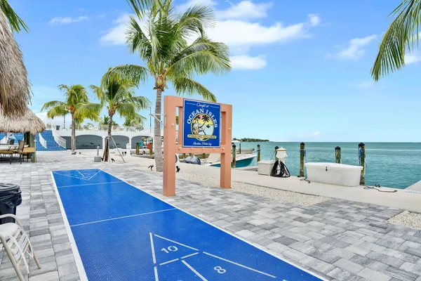 a view of ocean view with palm trees