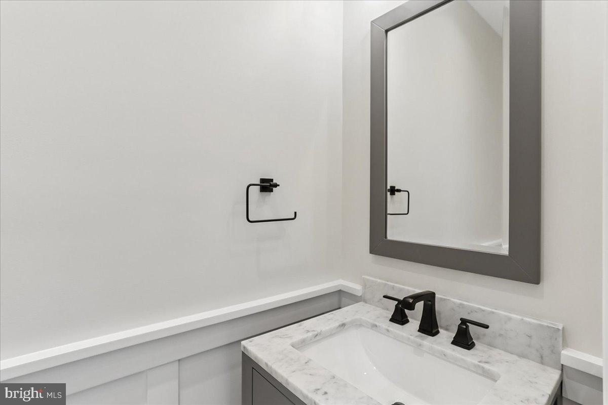 3929 Fulton Street Northwest, Unit A Washington, DC 20007 - Photo 10 of 79 Main Level Powder Room