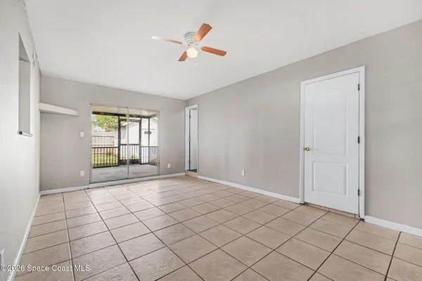 a view of an empty room and window