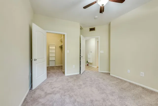 a kitchen with stainless steel appliances a stove a microwave and a refrigerator