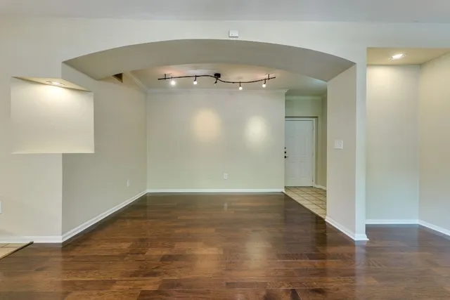 a view of a swimming pool with chairs