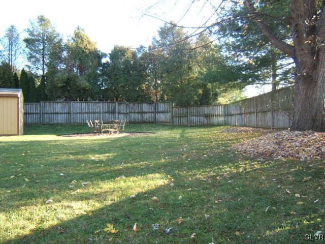 7616 Buttercup Road Lower Macungie Township, PA 18062 - Photo 4 of 11 a backyard of a house