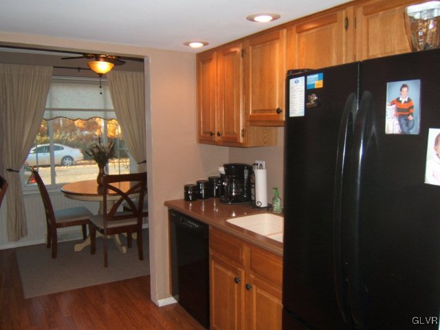 7616 Buttercup Road Lower Macungie Township, PA 18062 - Photo 10 of 11 a kitchen with stainless steel appliances granite countertop a refrigerator and a sink