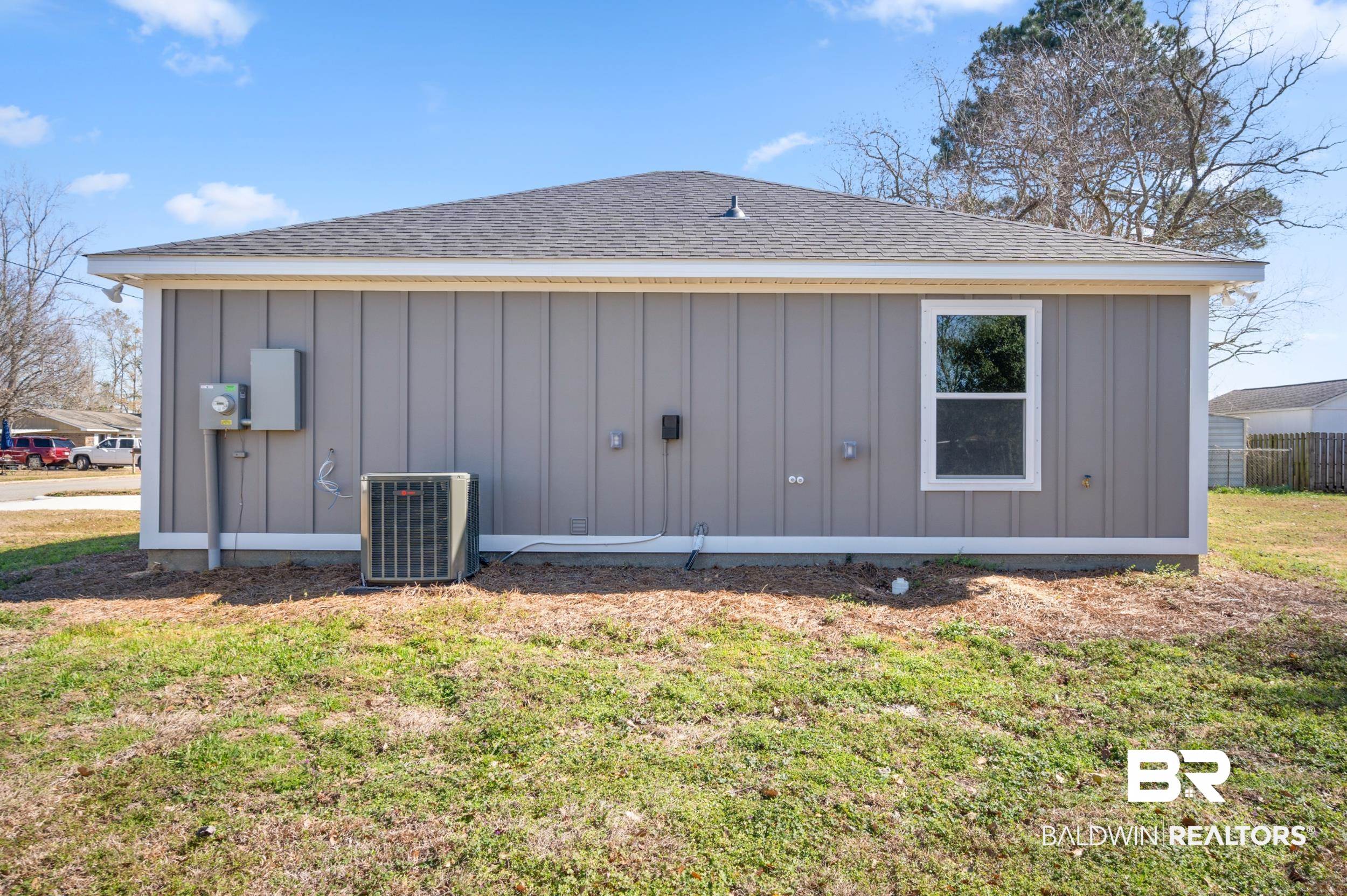 76 Fincher Lane Loxley, AL 36551 - Photo 29 of 33 View of side of property featuring board and batten siding and a shingled roof