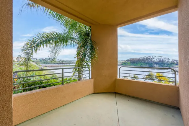 a view of a room that has a bed