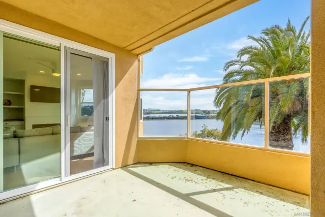 a view of a swimming pool with a yard